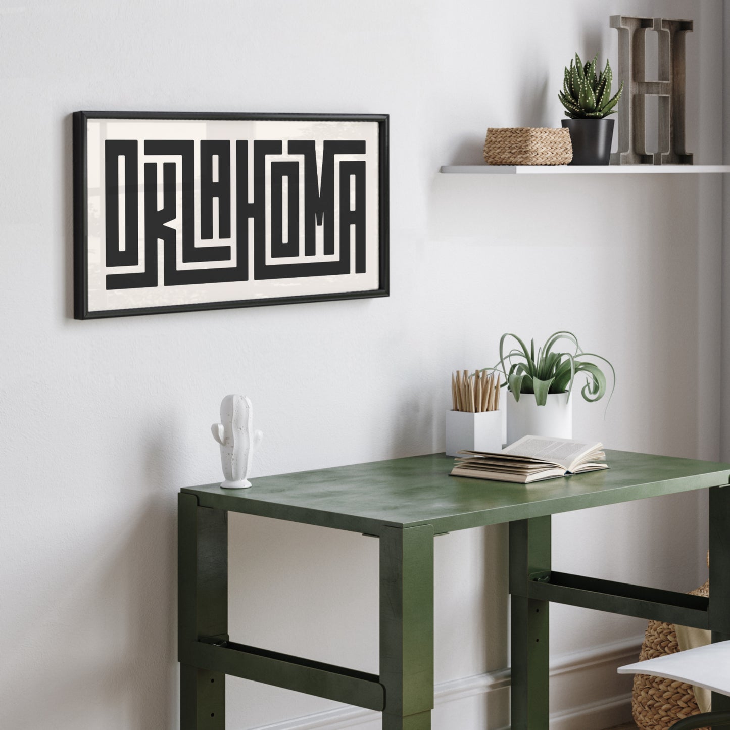 Personalized Oklahoma art poster in Black Frame above desk in minimalist dorm room.