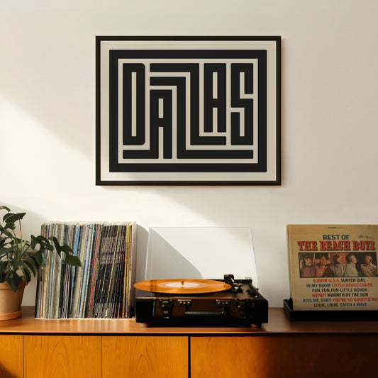 Retro Dallas artwork above vintage record player on Mid-Century Modern furniture.