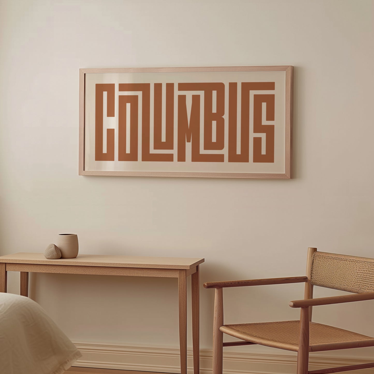 Wood framed minimalist Columbus Wall Decor in Boho style room wtih neutral colors