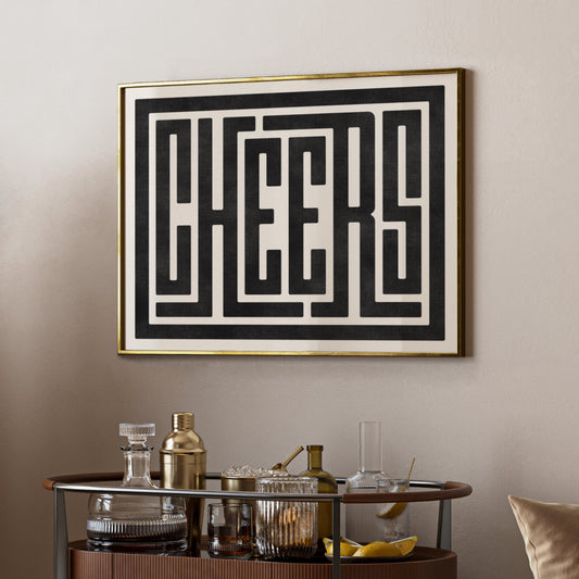 Trendy cocktail Cheers art print above bar cart