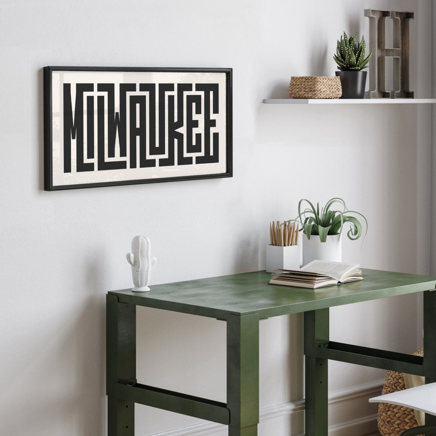 Personalized Milwaukee poster in Black Frame above desk in minimalist dorm room.
