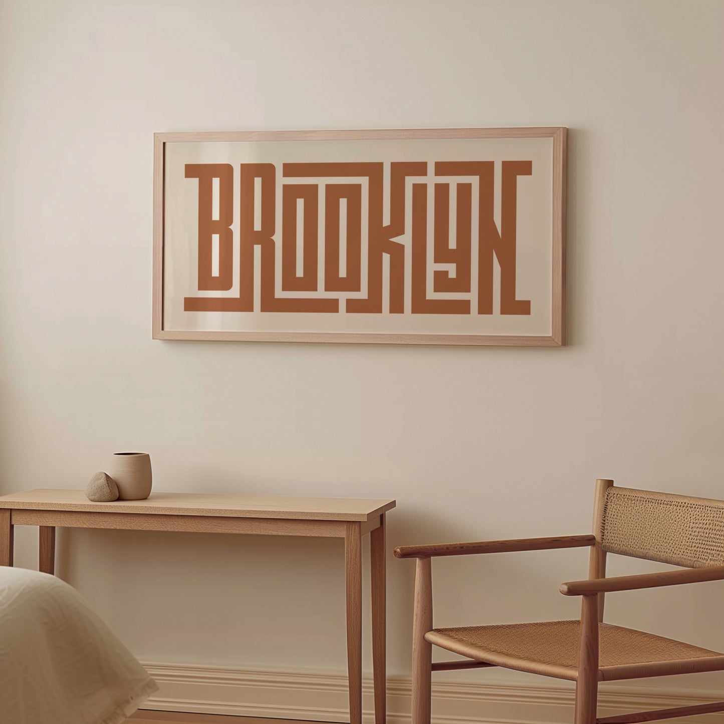Wood framed minimalist Brooklyn Wall Decor in Boho style room wtih neutral colors