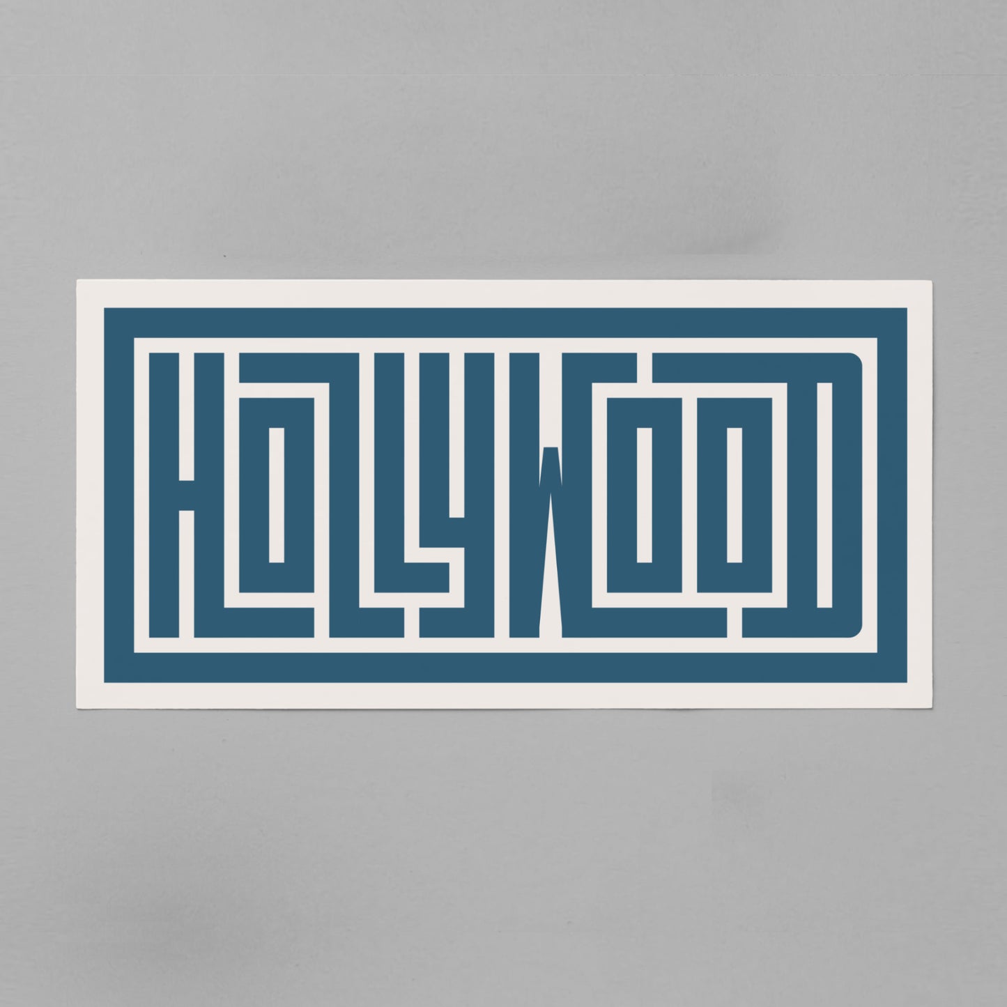 Personalized Hollywood poster in Black Frame above desk in minimalist dorm room.