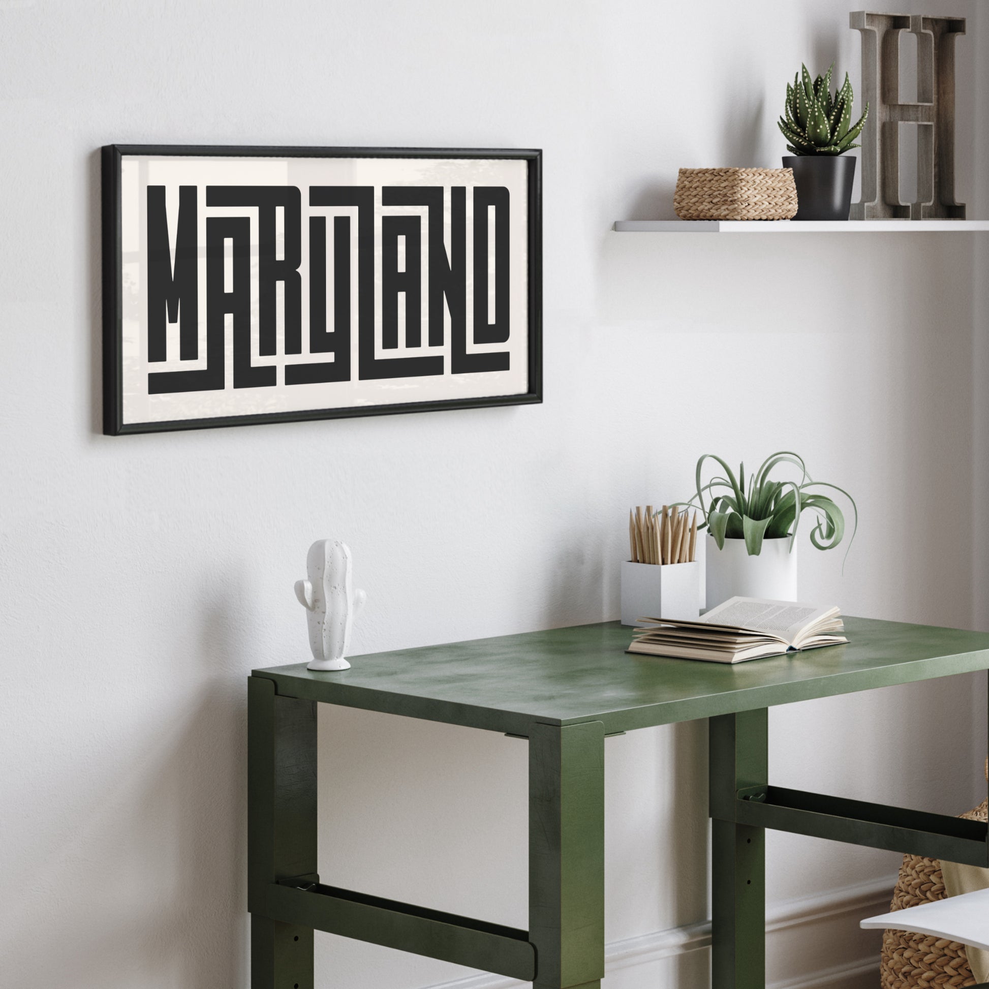 Personalized Maryland art poster in Black Frame above desk in minimalist dorm room.