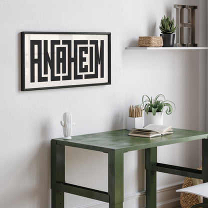 Personalized Anaheim art poster in Black Frame above desk in minimalist dorm room.