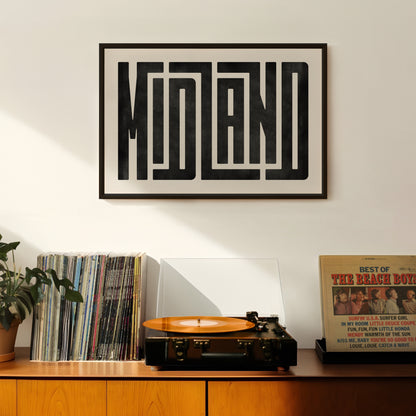Retro Midland artwork above vintage record player on Mid-Century Modern furniture.
