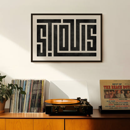 Retro St. Louis artwork above vintage record player on Mid-Century Modern furniture.