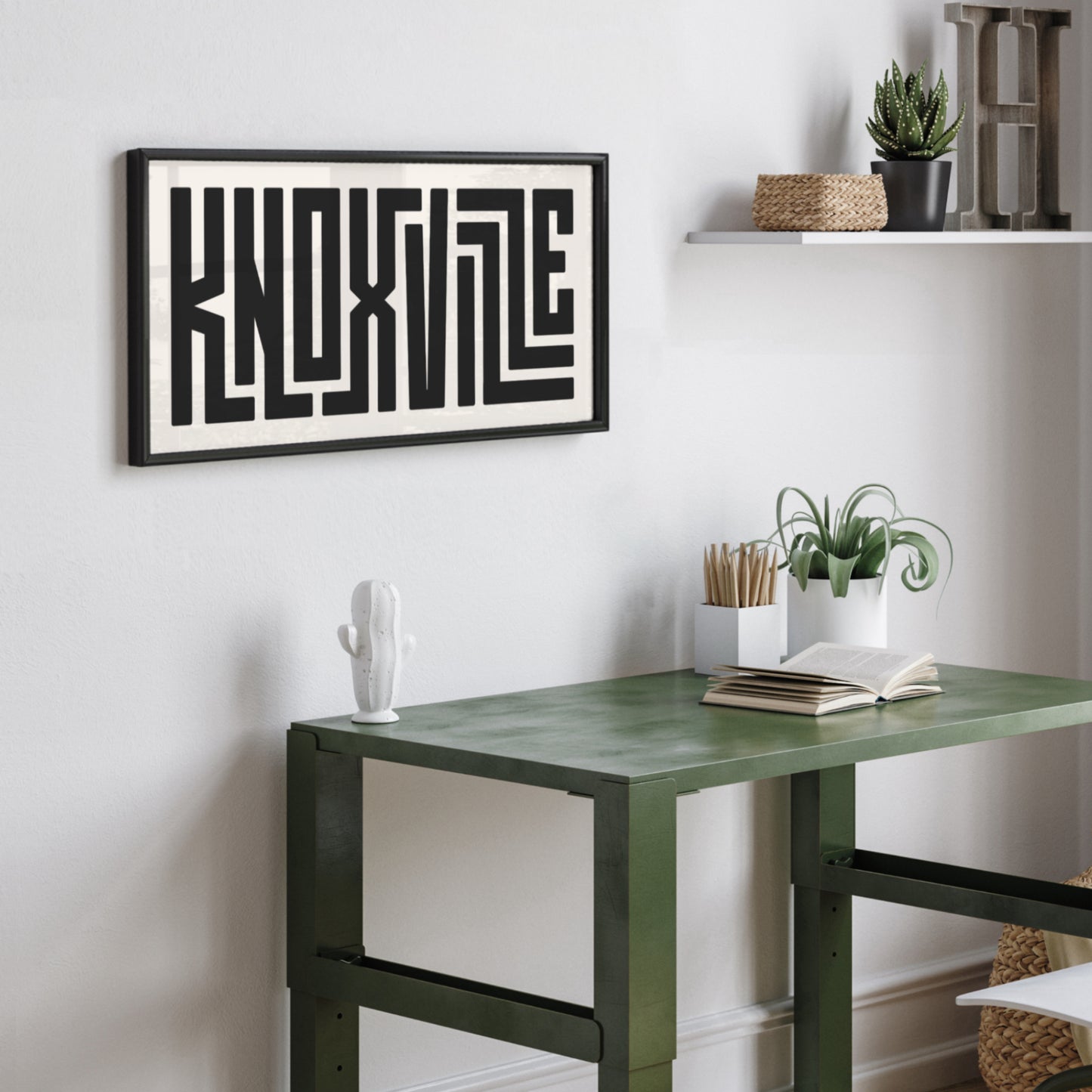 Personalized Knoxville poster in Black Frame above desk in minimalist dorm room.