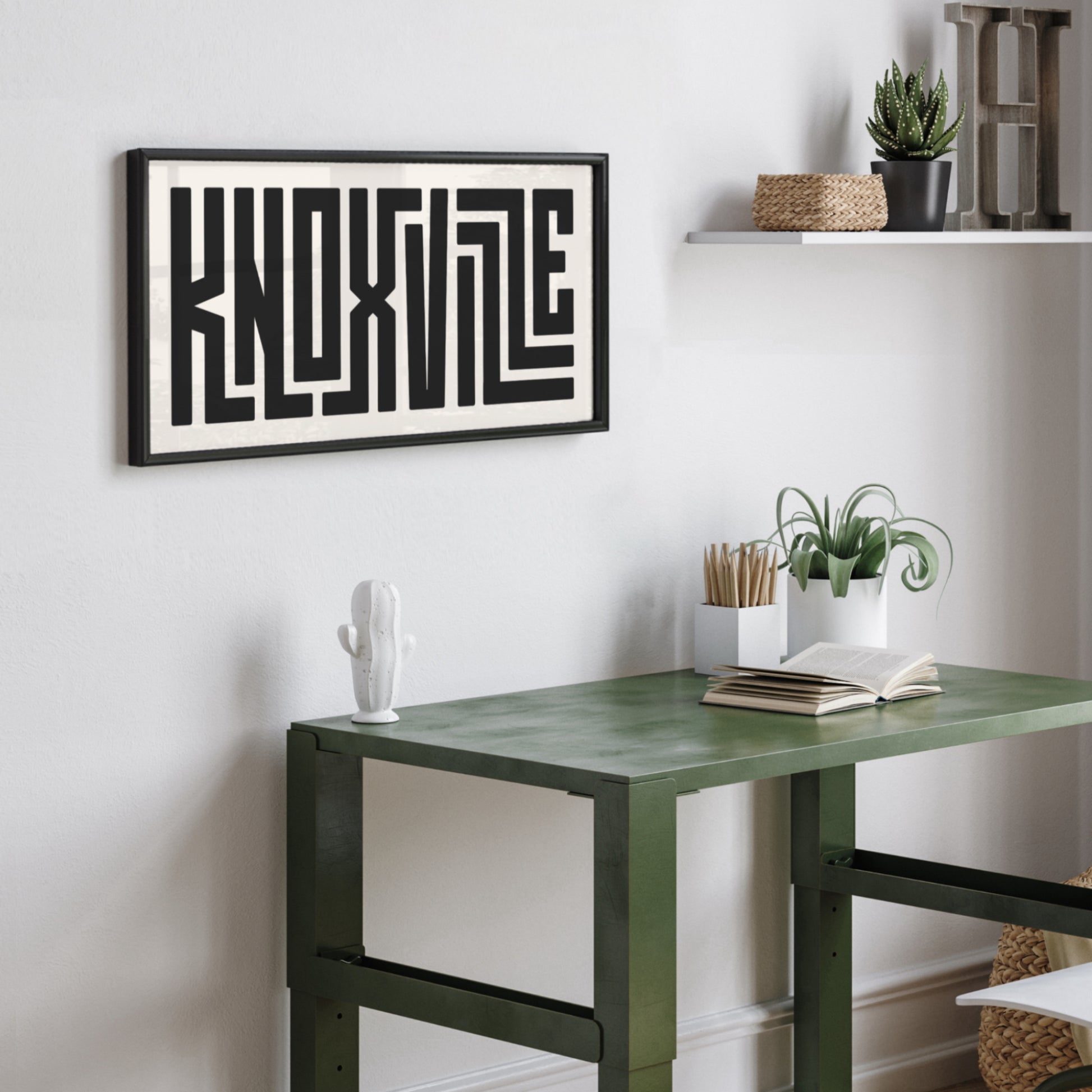 Personalized Knoxville poster in Black Frame above desk in minimalist dorm room.