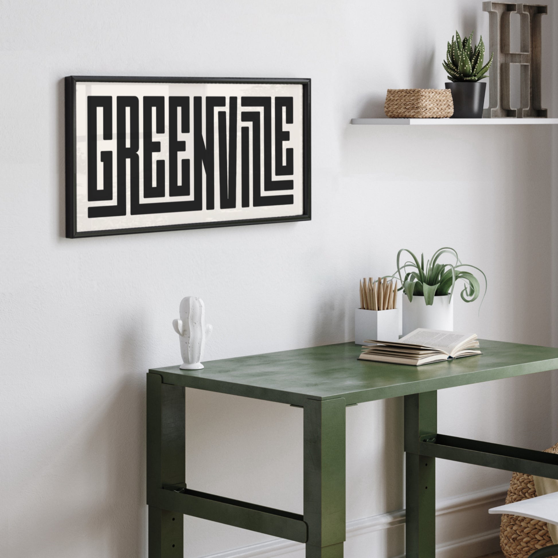 Personalized Greenville poster in Black Frame above desk in minimalist dorm room.