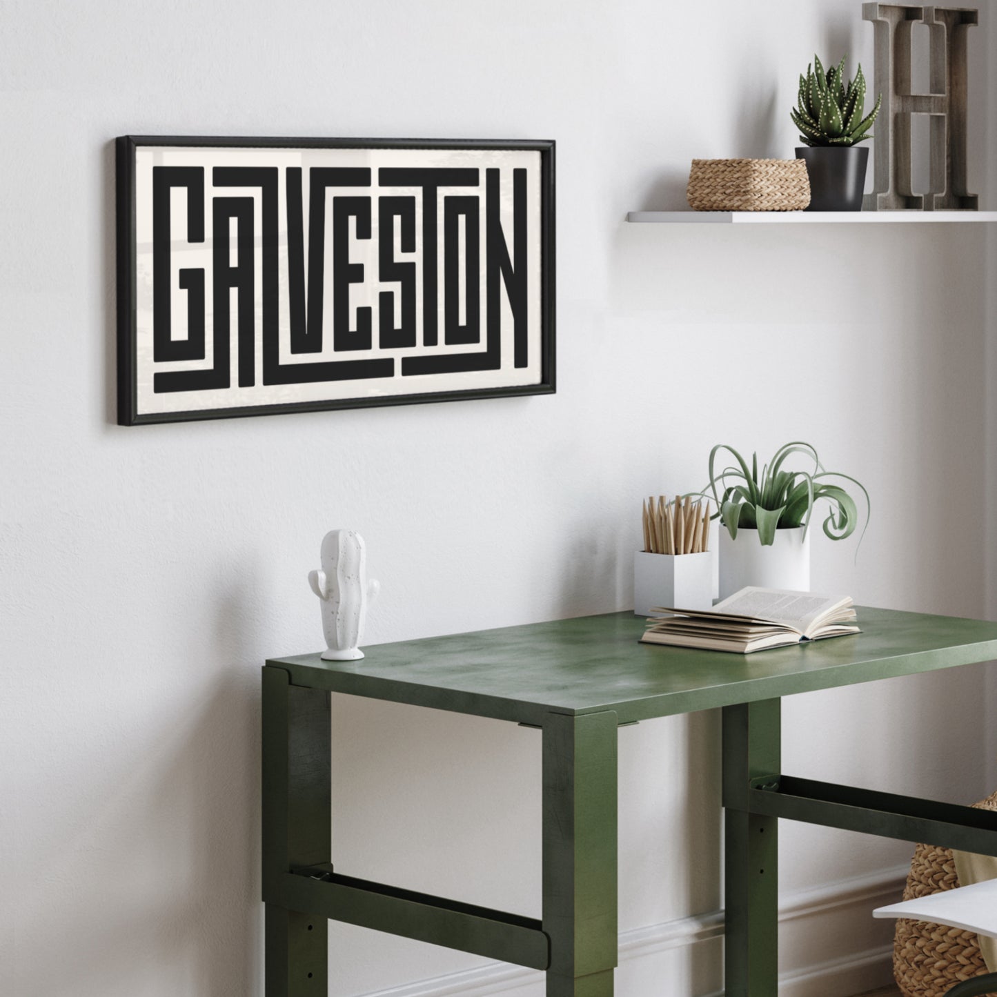 Personalized Galveston poster in Black Frame above desk in minimalist dorm room.