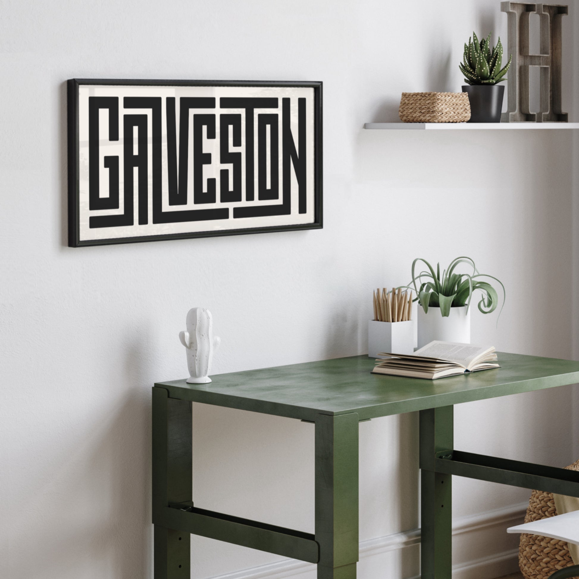 Personalized Galveston poster in Black Frame above desk in minimalist dorm room.