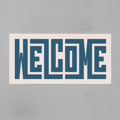 Retro Welcome artwork above vintage record player on Mid-Century Modern furniture.