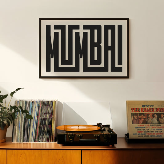 Retro Mumbai artwork above vintage record player on Mid-Century Modern furniture.
