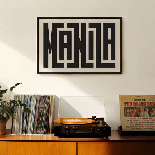 Retro Manila artwork above vintage record player on Mid-Century Modern furniture.